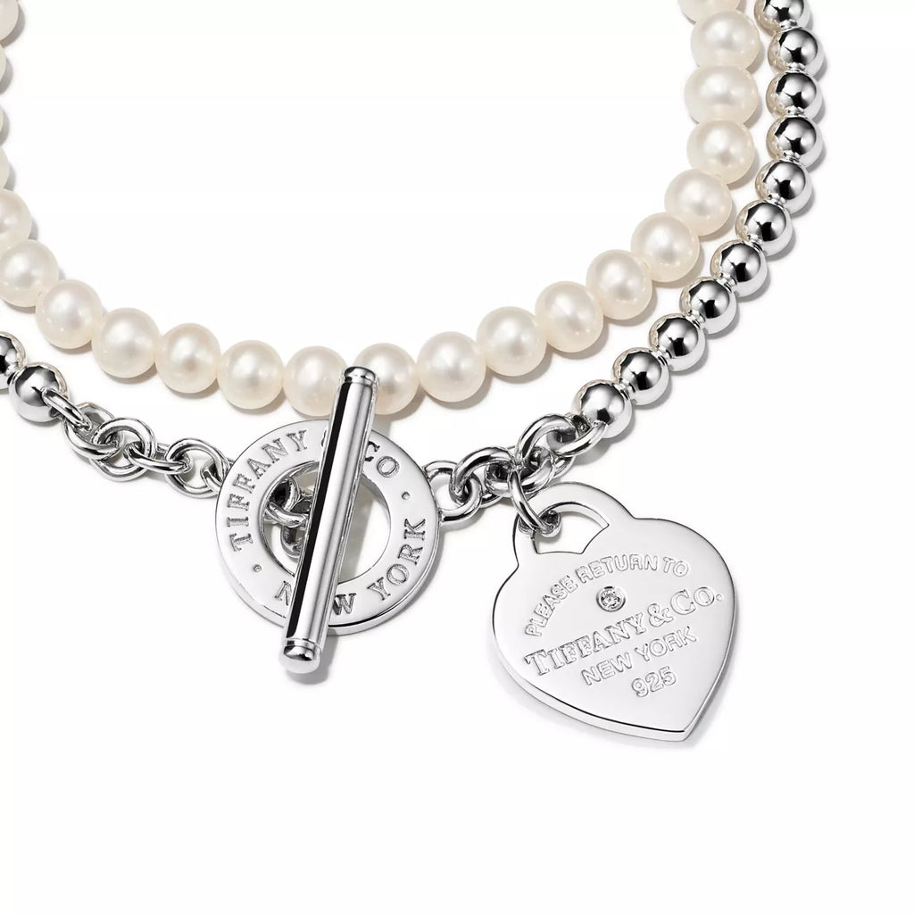 Pulsera de cuentas envolvente en plata con perlas y un diamante