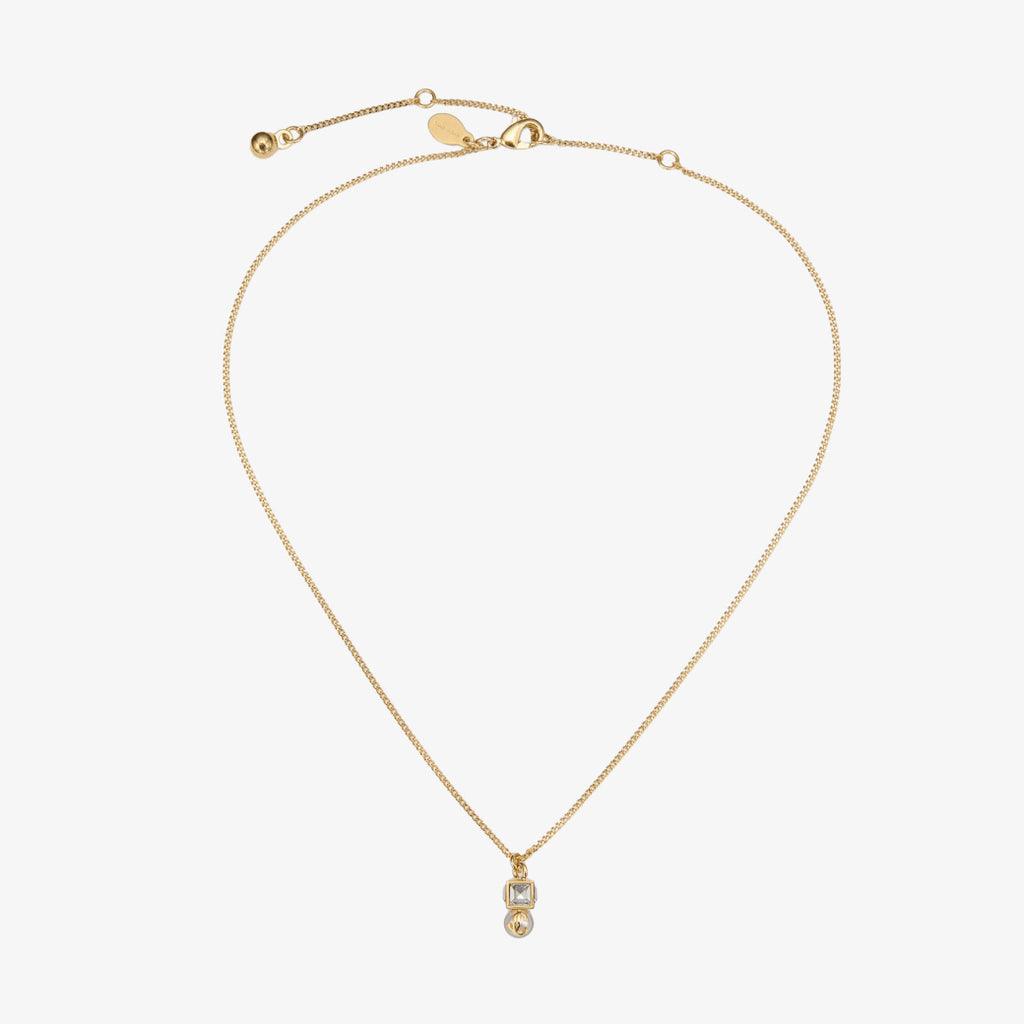 Colgante de metal dorado con perla y cristal color gold